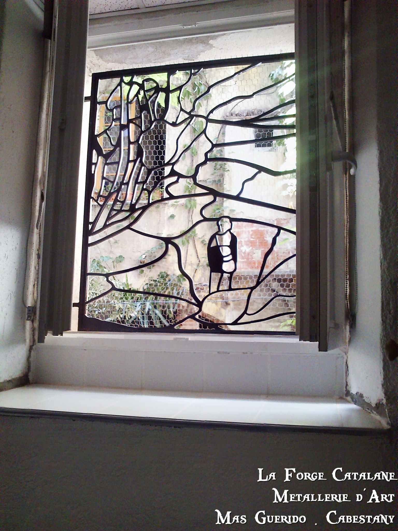 grille fixe découpe laser motif pelerin fer forge catalane.jpg